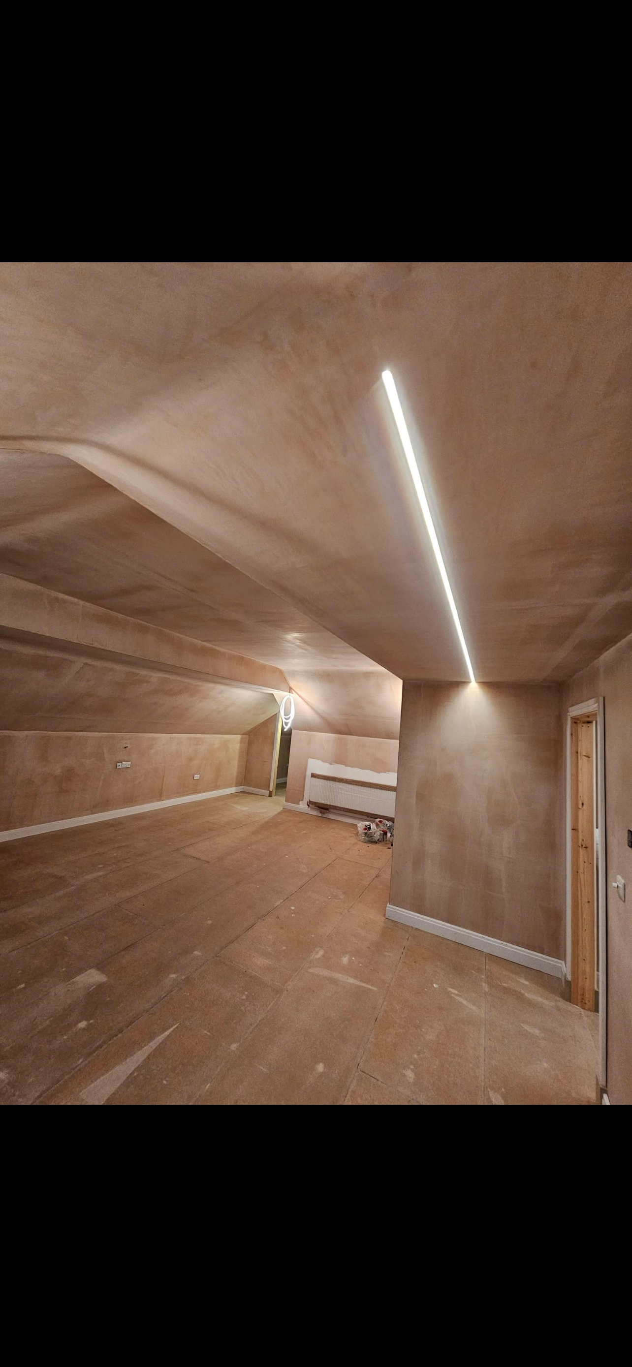 Workshop space with plaster walls and scaffolding